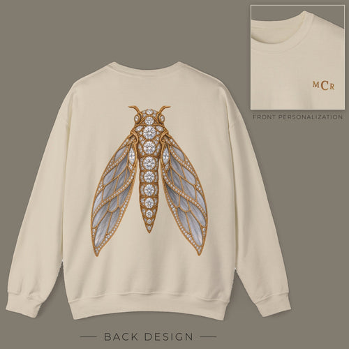 Back of sand sweatshirt with jeweled diamond cicada brooch design; inset shows the front with personalized monogram on the left chest