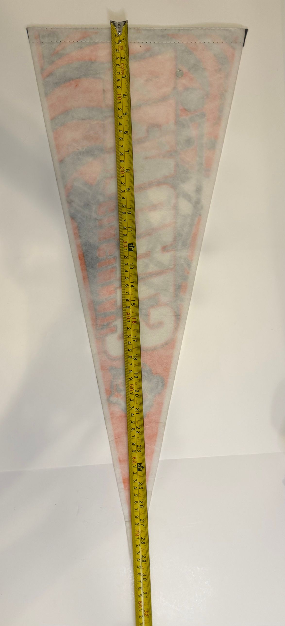 Back of pennant with tape measure