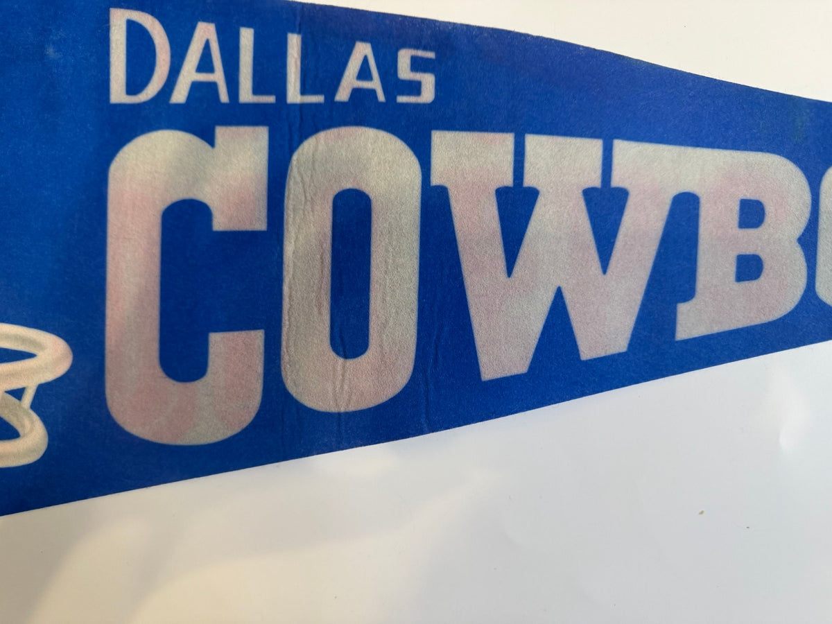 Lettering with pink dye transfer and crease