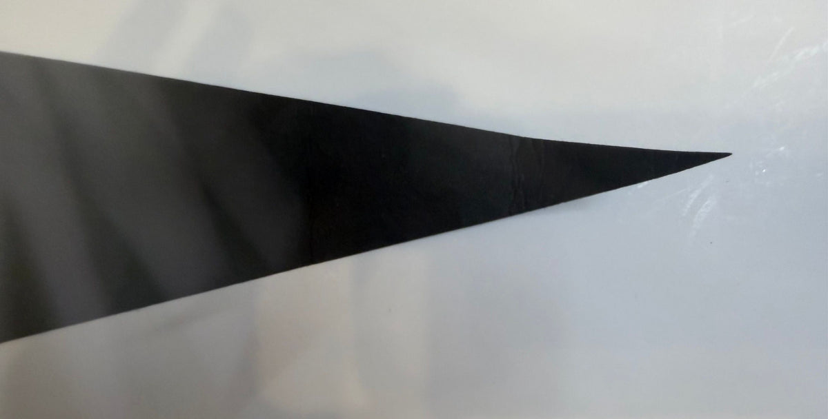Fold crease near tip