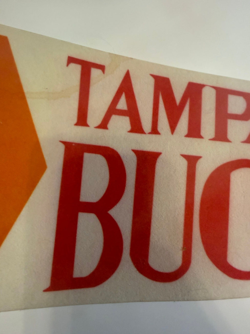 Lettering with tan water stain