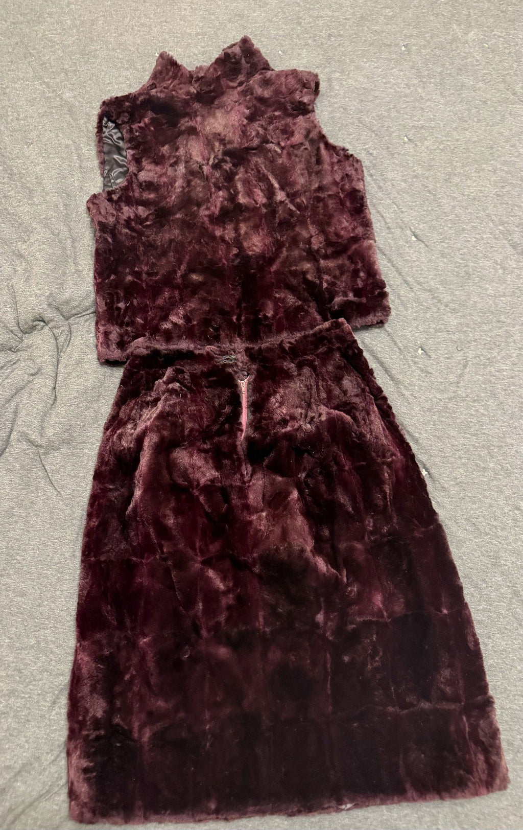 Fur vest and skirt laid flat, back
