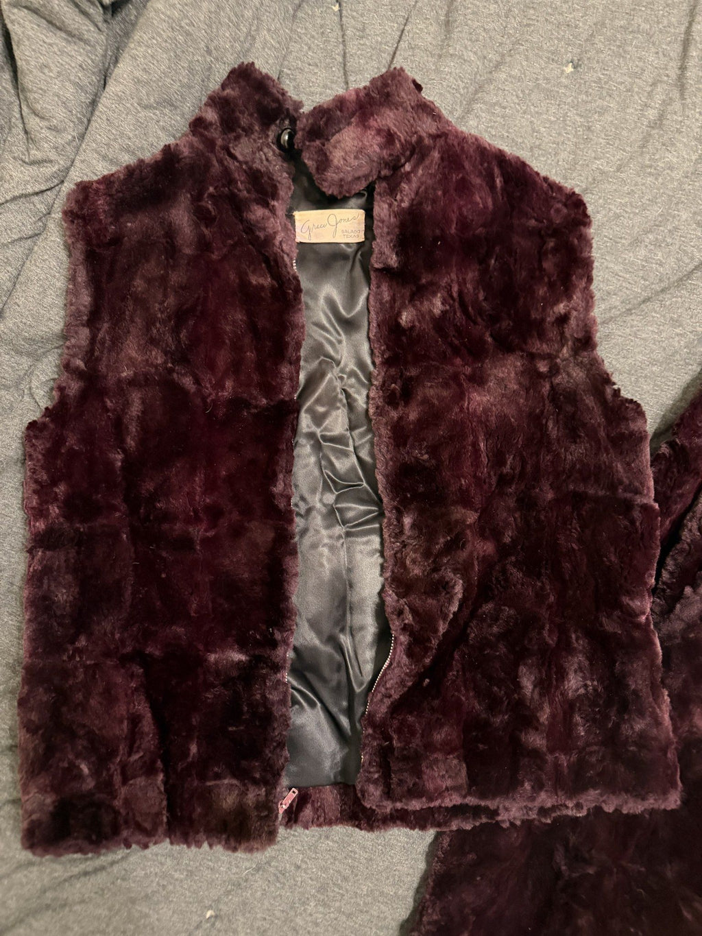 Fur vest open showing satin lining and Grace Jones Salado label
