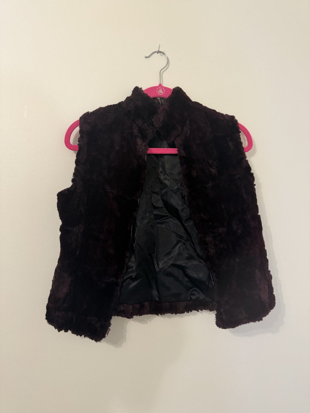 Fur vest unzipped showing lining