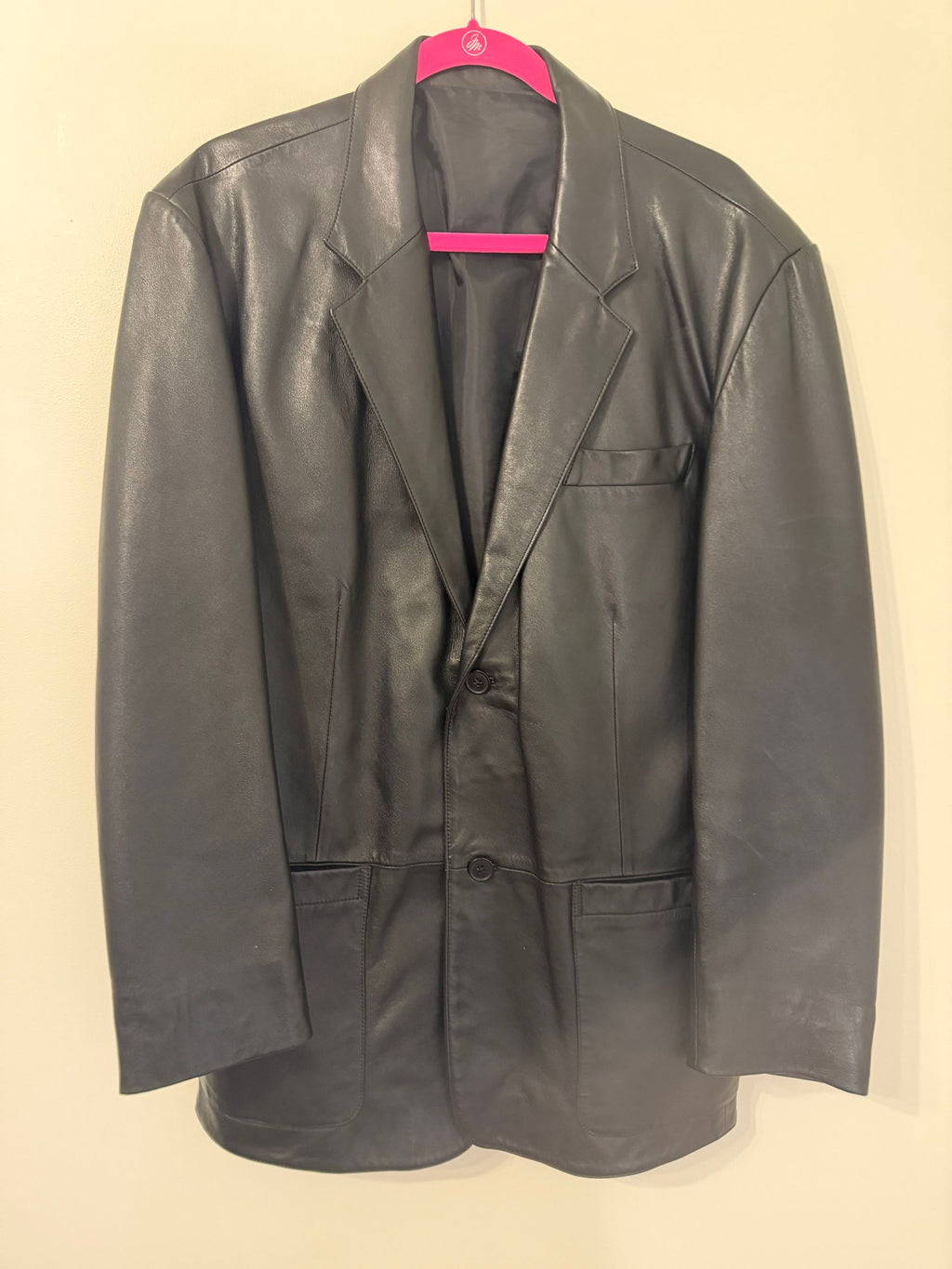 Black leather blazer buttoned, front