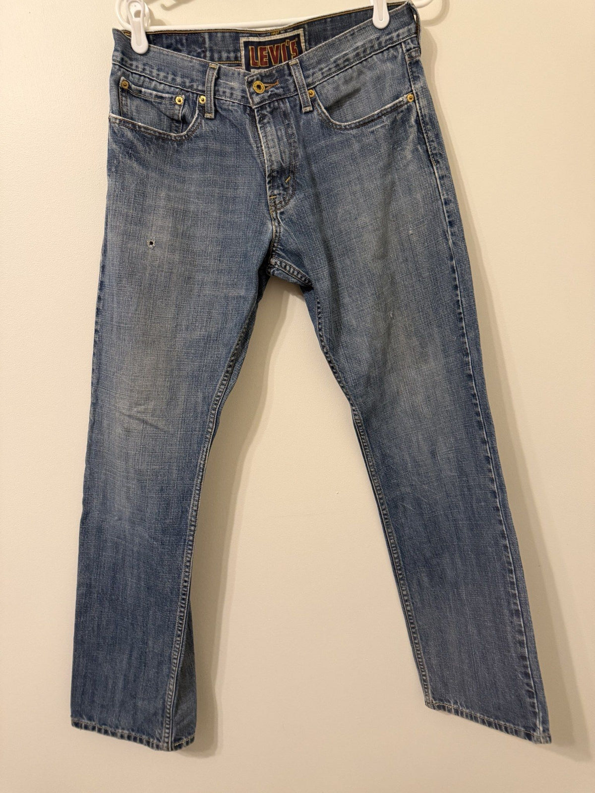 Y2K Levi's 514 slim straight jeans medium wash front