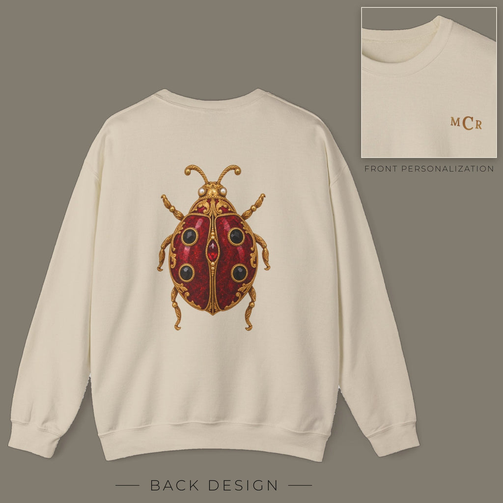 Back of sand sweatshirt with jeweled garnet ladybug brooch design; inset shows the front with personalized monogram on the left chest