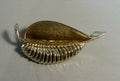 Vintage gold tone curled leaf brooch