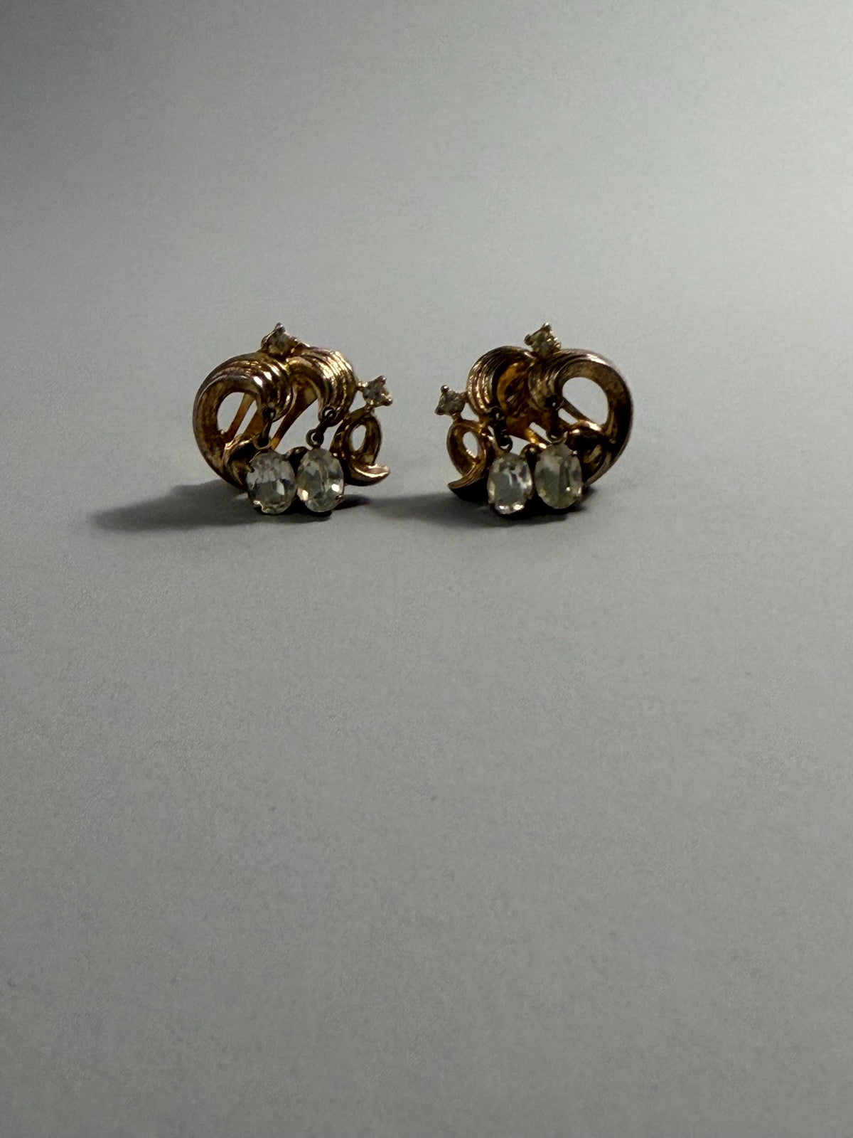 Vintage Signed Tilari Rhinestone Clip-On Earrings, Gold Tone Swirl