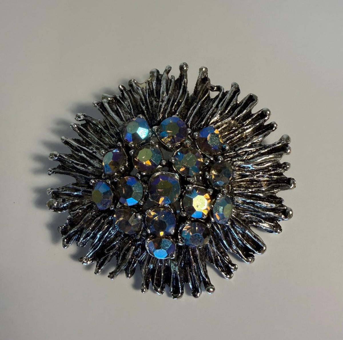Vintage aurora borealis rhinestone starburst brooch