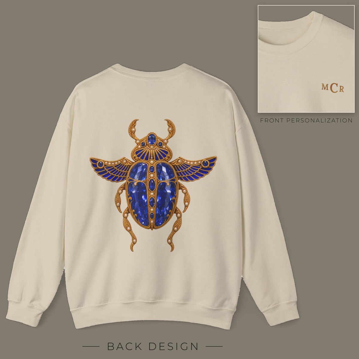 Back of sand sweatshirt with jeweled sapphire scarab brooch design; inset shows the front with personalized monogram on the left chest